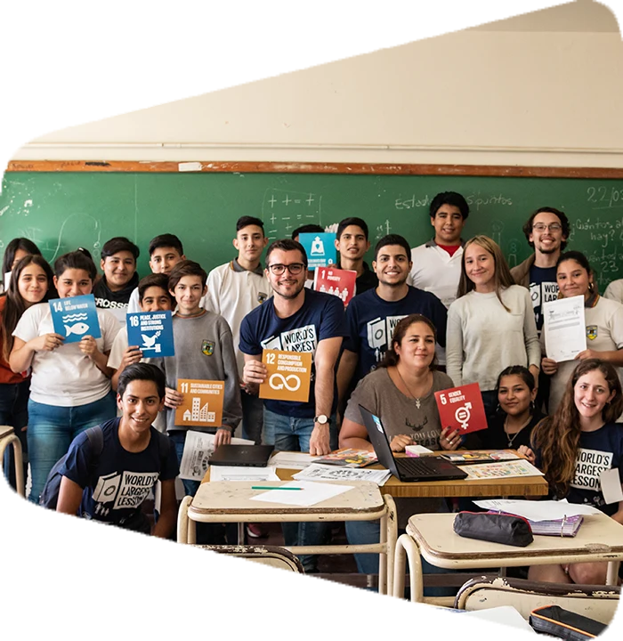 AIESEC volunteers showcasing the Sustainable Development goals in a classroom in Argentina after during the event called World Largest Lesson